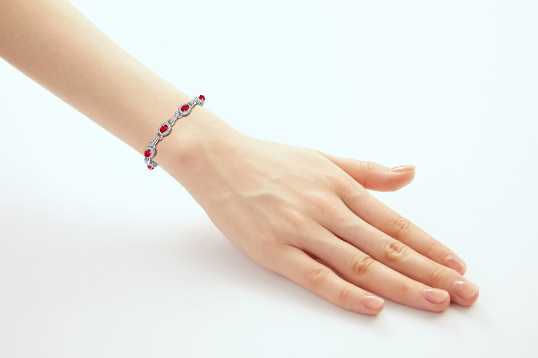 RYLOS Tennis Bracelet with Gemstones & Diamond Halo Sterling Silver 925  - Adjustable 7-8" Wrist, 9 Stunning 6x4MM Birthstone Jewelry for Women - Perfect for Friendship and Elegance."